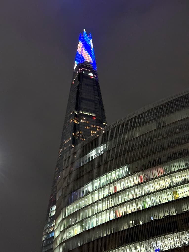 the shard in london lit up at night